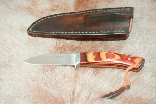 A beautifully custom hand-made original "Brent E Sandow" hunter knife in its original leather sheath