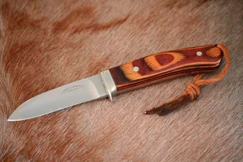 A beautifully custom hand-made original "Brent E Sandow" hunter knife in its original leather sheath