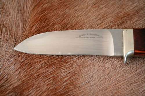 A beautifully custom hand-made original "Brent E Sandow" hunter knife in its original leather sheath