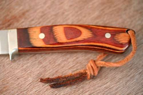 A beautifully custom hand-made original "Brent E Sandow" hunter knife in its original leather sheath