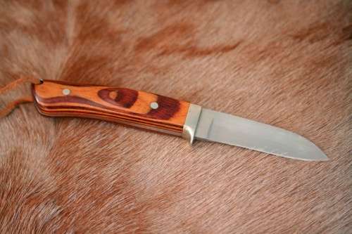 A beautifully custom hand-made original "Brent E Sandow" hunter knife in its original leather sheath