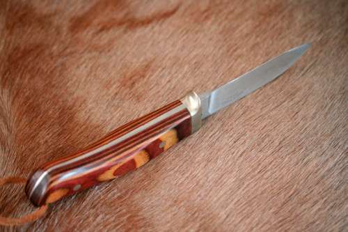 A beautifully custom hand-made original "Brent E Sandow" hunter knife in its original leather sheath