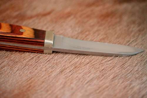 A beautifully custom hand-made original "Brent E Sandow" hunter knife in its original leather sheath