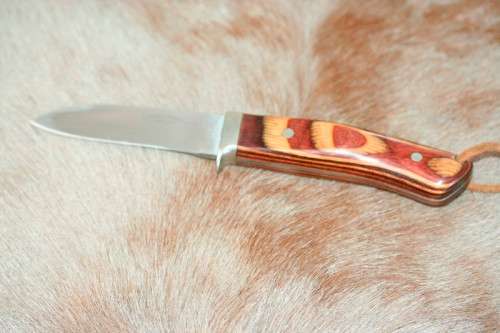 A beautifully custom hand-made original "Brent E Sandow" hunter knife in its original leather sheath