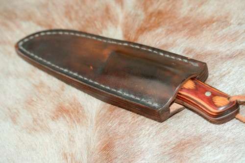 A beautifully custom hand-made original "Brent E Sandow" hunter knife in its original leather sheath