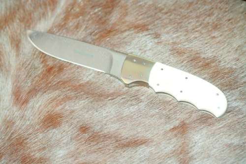 Incredible custom made Mike Skellern Damascus steel & bone handle knife w/ brass embellishments