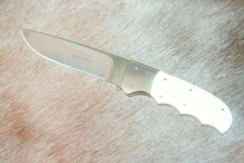 Incredible custom made Mike Skellern Damascus steel & bone handle knife w/ brass embellishments