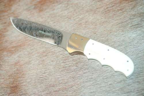 Incredible custom made Mike Skellern Damascus steel & bone handle knife w/ brass embellishments