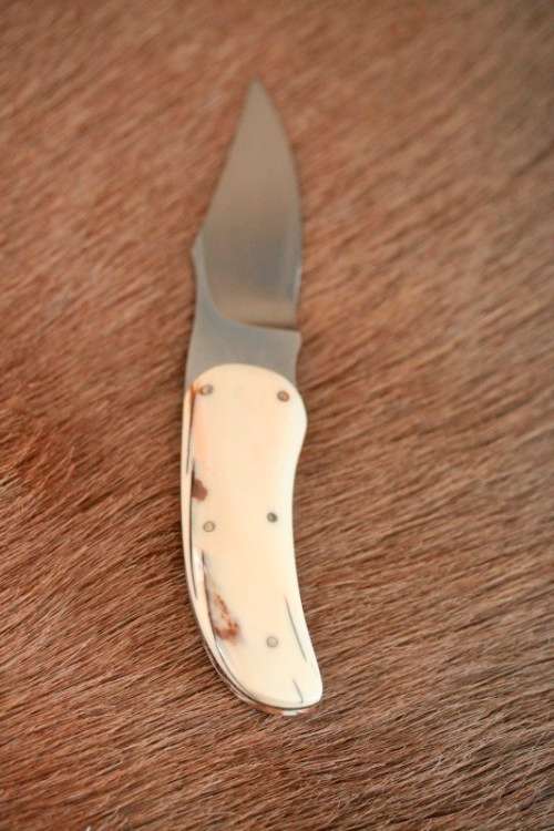 **RS17** Beautifully made Arno Bernard Snr. antique Warthog bone-handle knife w/ original sheath