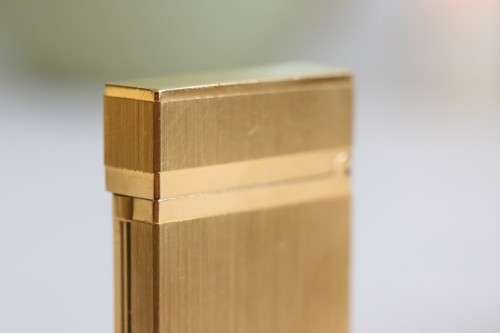 Spectacular S.T Dupont Ligne 2 brushed gold finished lighter - the ultimate addition to a collection