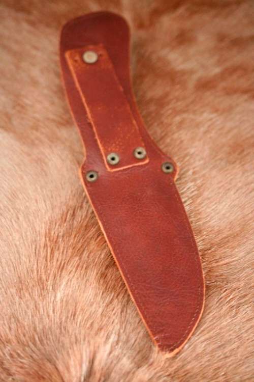 **RS17** A fantastic "surgical steel" Torro Model AS1004 Hunter knife in its original leather sheath