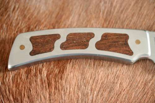 **RS17** A fantastic "surgical steel" Torro Model AS1004 Hunter knife in its original leather sheath