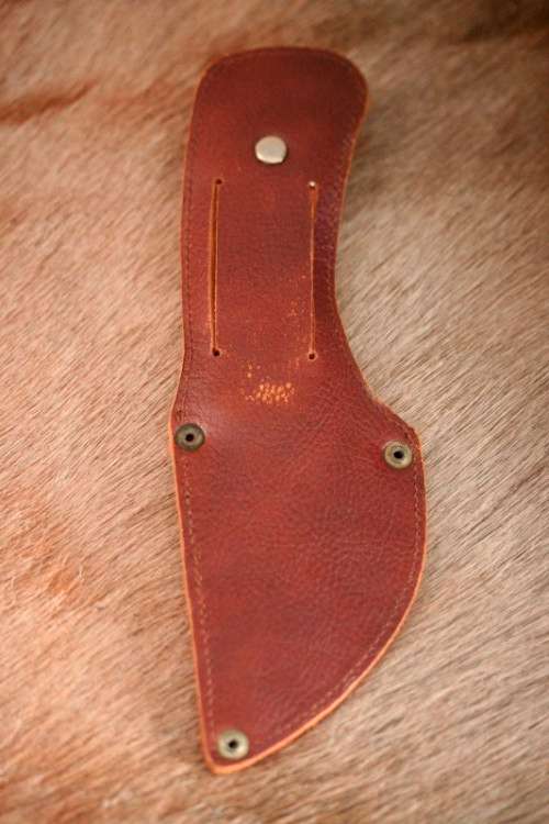 An awesome "surgical steel" Torro Model AS1003 "skinning" knife in its original leather sheath