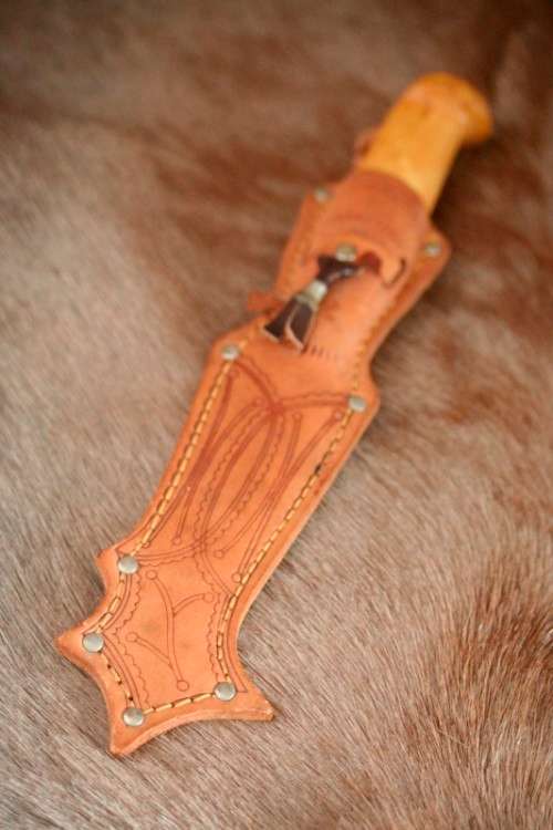 An awesome Finish made J. Marttiini Inox fishing knife in its original reindeer leather sheath