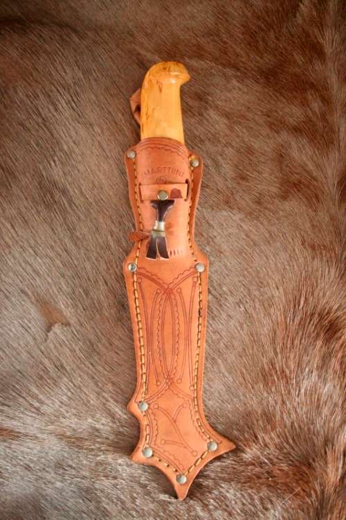 An awesome Finish made J. Marttiini Inox fishing knife in its original reindeer leather sheath