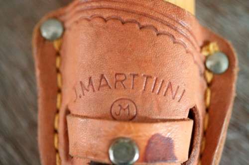 An awesome Finish made J. Marttiini Inox fishing knife in its original reindeer leather sheath
