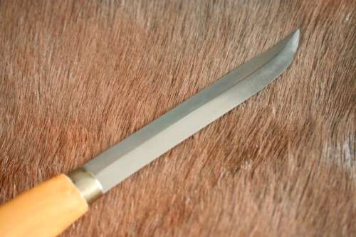 An awesome Finish made J. Marttiini Inox fishing knife in its original reindeer leather sheath