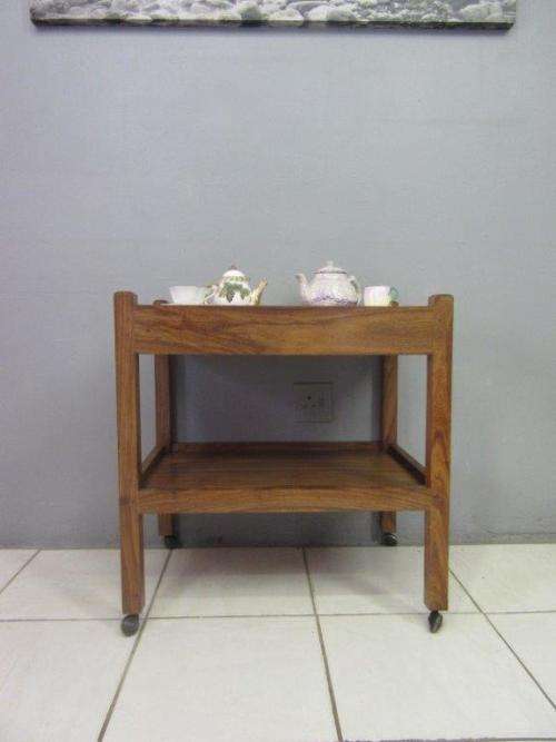 A lovely vintage teak drinks/ tea trolley on castors in good condition - great for afternoon tea!