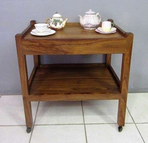 A lovely vintage teak drinks/ tea trolley on castors in good condition - great for afternoon tea!