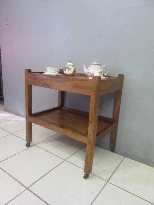 A lovely vintage teak drinks/ tea trolley on castors in good condition - great for afternoon tea!
