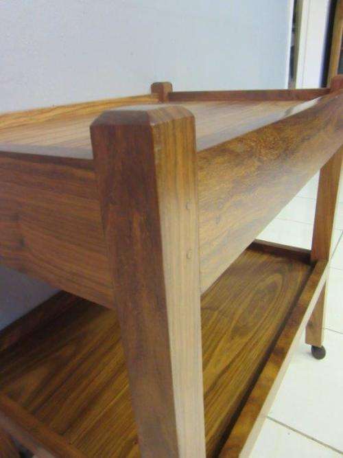 A lovely vintage teak drinks/ tea trolley on castors in good condition - great for afternoon tea!