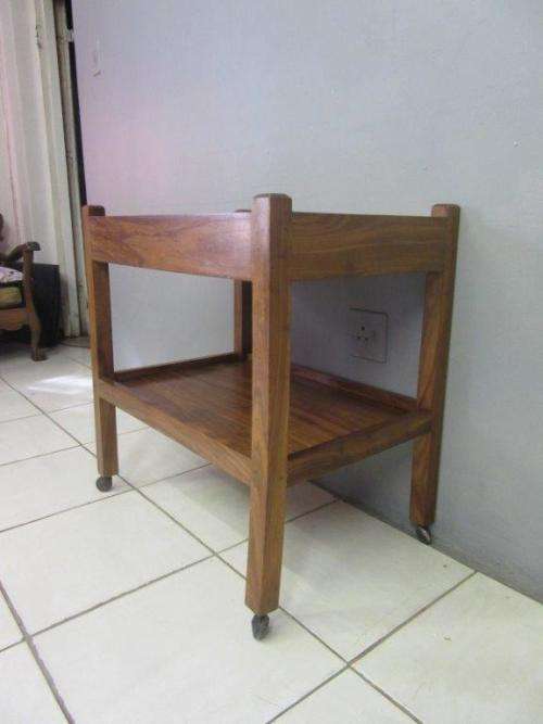 A lovely vintage teak drinks/ tea trolley on castors in good condition - great for afternoon tea!