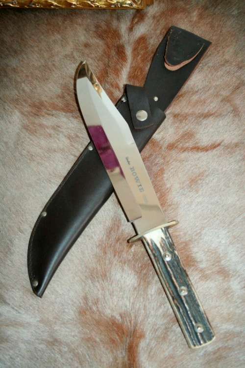 A superb original handmade German Solingen Inox Linder Bowie knife in its embossed leather scabbard