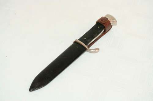 An extremely rare WWII German (early issue) "Hitler Youth" Blut und Ehre knife and scabbard