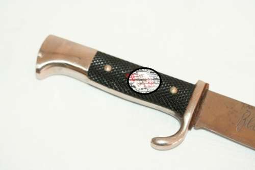 An extremely rare WWII German (early issue) "Hitler Youth" Blut und Ehre knife and scabbard