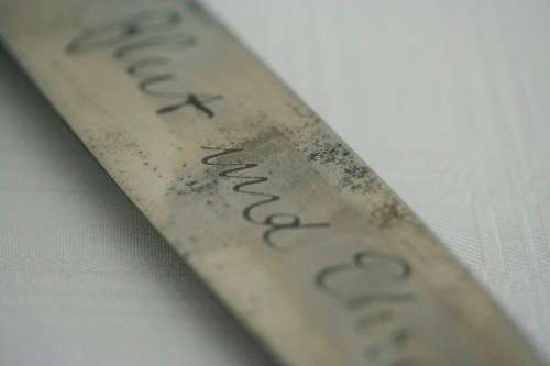 An extremely rare WWII German (early issue) "Hitler Youth" Blut und Ehre knife and scabbard