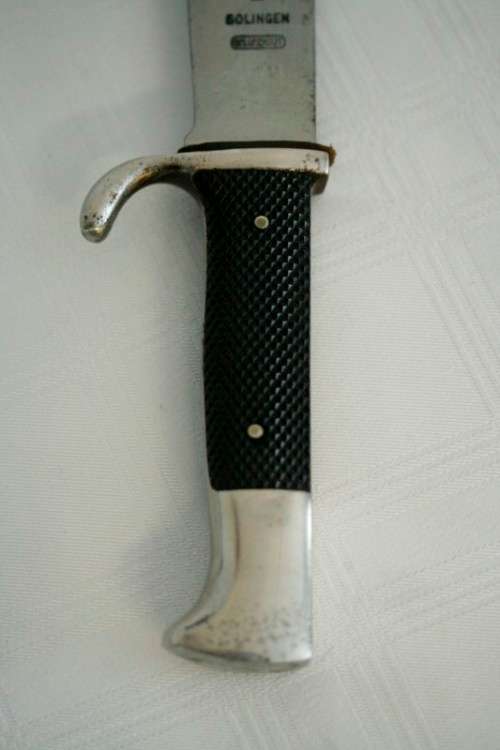 An extremely rare WWII German (early issue) "Hitler Youth" Blut und Ehre knife and scabbard