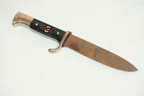 An extremely rare WWII German (early issue) "Hitler Youth" Blut und Ehre knife and scabbard