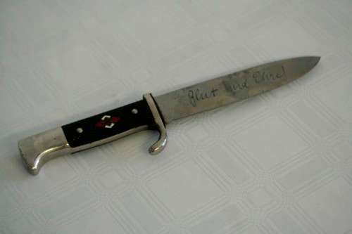 An extremely rare WWII German (early issue) "Hitler Youth" Blut und Ehre knife and scabbard