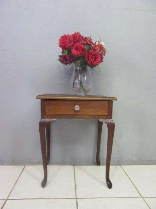 A very stylish imbuia bedside table with amazing Queen Anne legs and a centre drawer - stunning!!