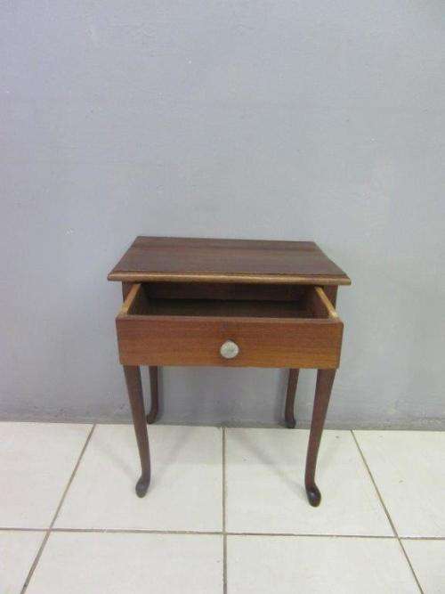 A very stylish imbuia bedside table with amazing Queen Anne legs and a centre drawer - stunning!!