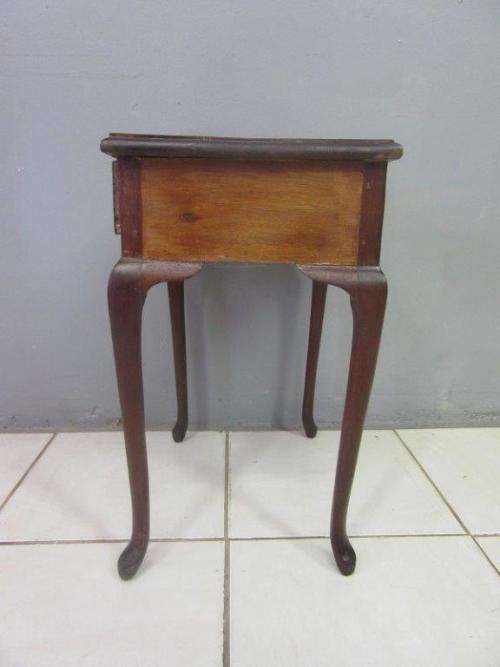 A very stylish imbuia bedside table with amazing Queen Anne legs and a centre drawer - stunning!!