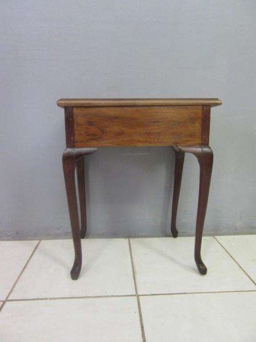A very stylish imbuia bedside table with amazing Queen Anne legs and a centre drawer - stunning!!