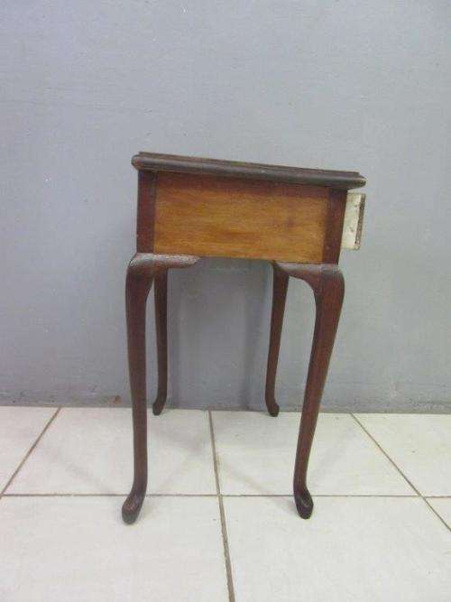 A very stylish imbuia bedside table with amazing Queen Anne legs and a centre drawer - stunning!!