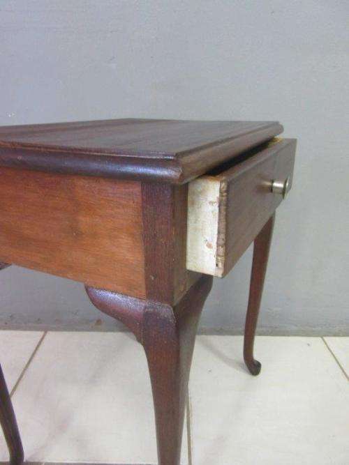 A very stylish imbuia bedside table with amazing Queen Anne legs and a centre drawer - stunning!!