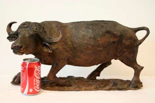 A stunning and very detailed large hand-carved African Buffalo carving in wonderful condition