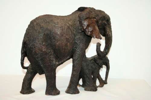 Absolutely stunning and beautifully carved large solid ironwood African elephant w/ her calf carving