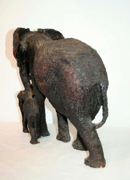 Absolutely stunning and beautifully carved large solid ironwood African elephant w/ her calf carving