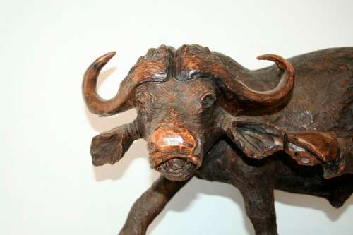 An awesome and very detailed large hand-carved African Buffalo carving in wonderful condition