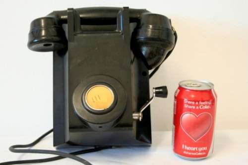 An exceptionally rare antique c1940 "Ericsson" black Bakelite hand-crank ships wall telephone