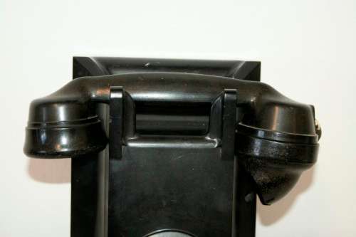 An exceptionally rare antique c1940 "Ericsson" black Bakelite hand-crank ships wall telephone