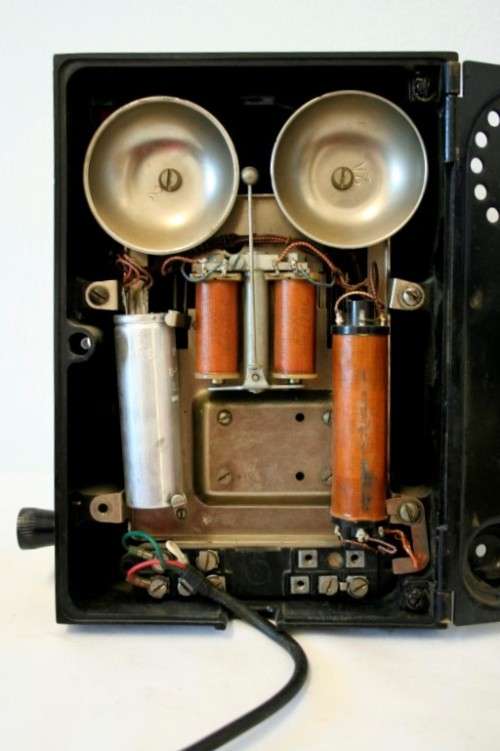 An exceptionally rare antique c1940 "Ericsson" black Bakelite hand-crank ships wall telephone