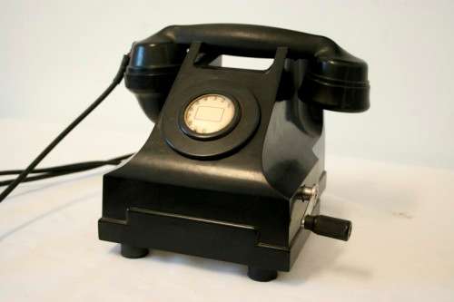 An amazing vintage British made Telephone Manufacturing Company (TMC) black Bakelite crank phone