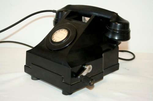 An amazing vintage British made Telephone Manufacturing Company (TMC) black Bakelite crank phone