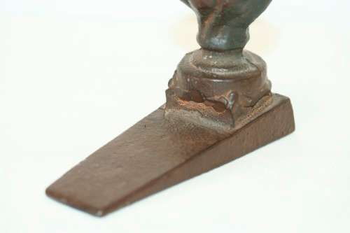 A superb and very practical antique Victorian cast iron (wedge) door stop in wonderful condition