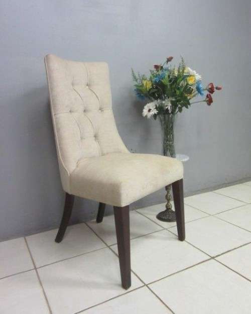 A stylish and beautifully upholstered hi-back occasional chair in a quality linen upholstery fabric
